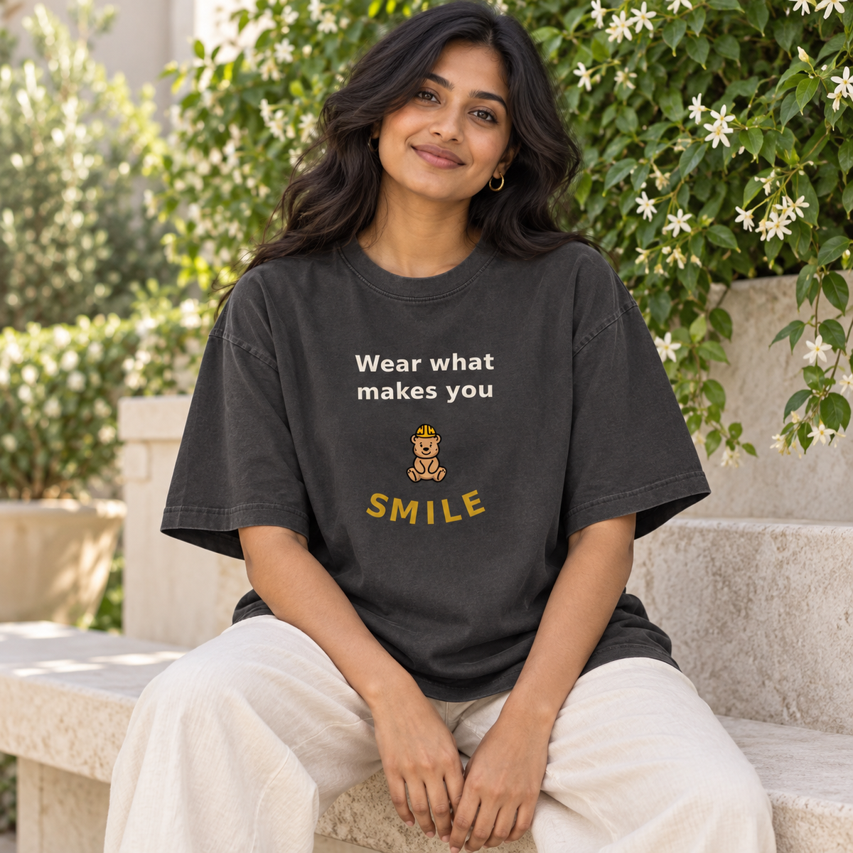 wear what makes you smile oversized tee 2 — garden lifestyle mockup.