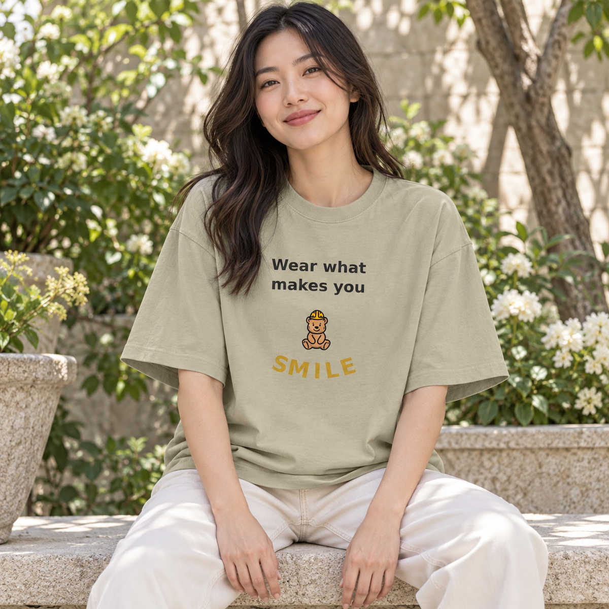 wear what makes you smile oversized tee 1 — garden lifestyle mockup.
