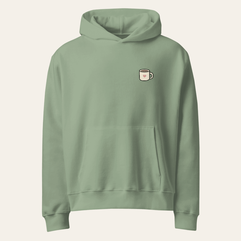Nothing Urgent oversized hoodie in Sage, front supplier mockup with heart mug on left chest