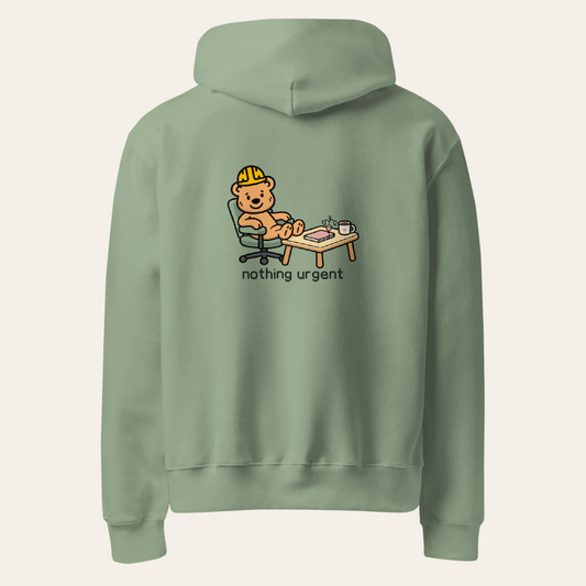 Nothing Urgent oversized hoodie in Sage, back supplier mockup with Tee Bear desk scene and nothing urgent lettering