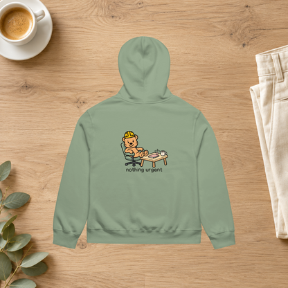 Sage Nothing Urgent hoodie back styled with ivory trousers and coffee in a lifestyle flatlay mockup; props not included