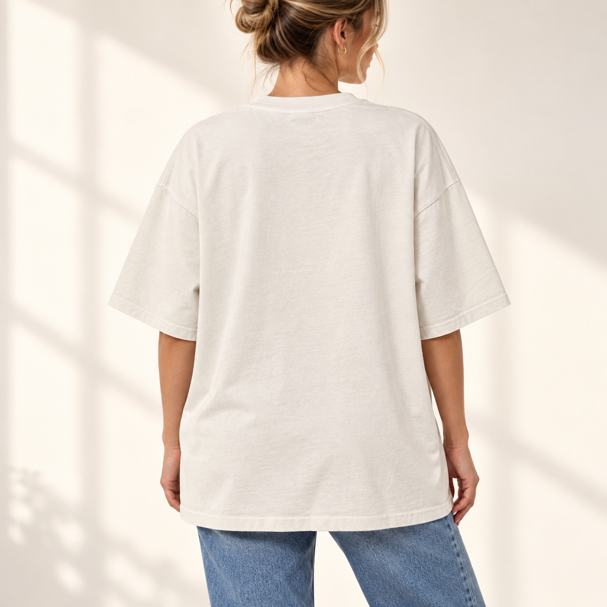 wear what makes you smile oversized tee — back fit mockup.