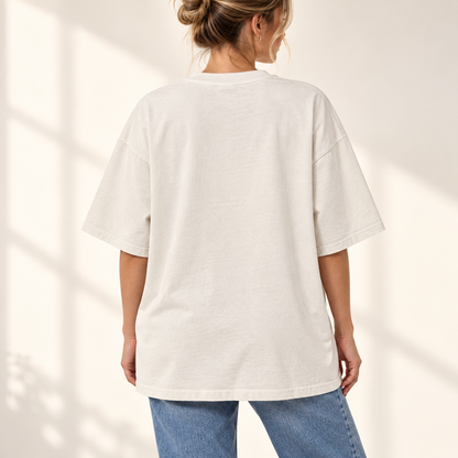 wear what makes you smile oversized tee — back fit mockup.