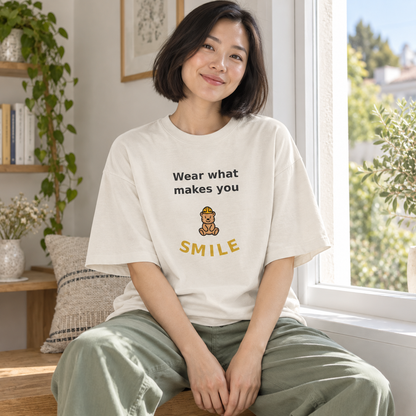wear what makes you smile oversized tee — window lifestyle mockup.