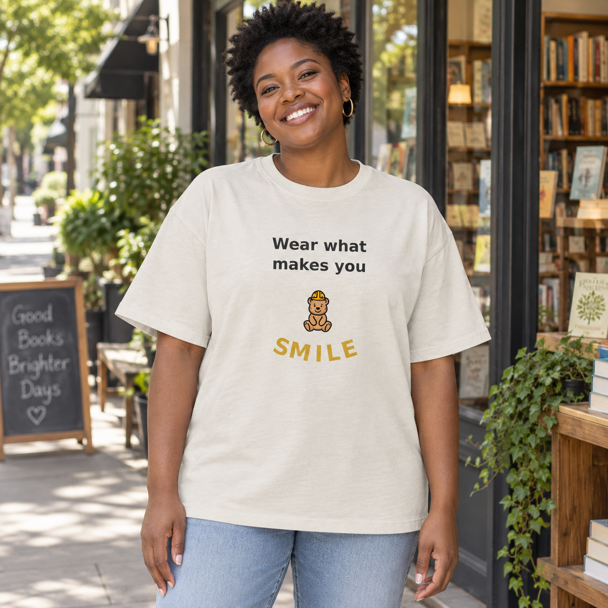 Wear What Makes You Smile Oversized Tee — Faded Bone — front artwork in a lifestyle mockup