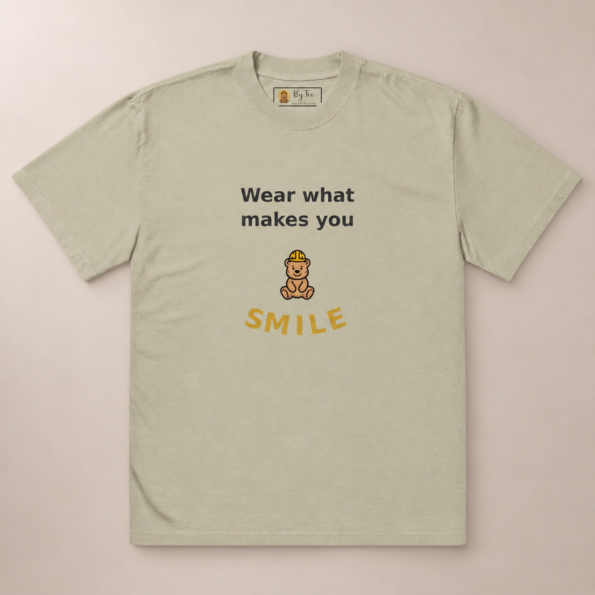 Wear What Makes You Smile Oversized Tee — Faded Eucalyptus by By Tee, front view on warm neutral background