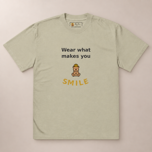 Wear What Makes You Smile Oversized Tee — Faded Eucalyptus by By Tee, front view on warm neutral background