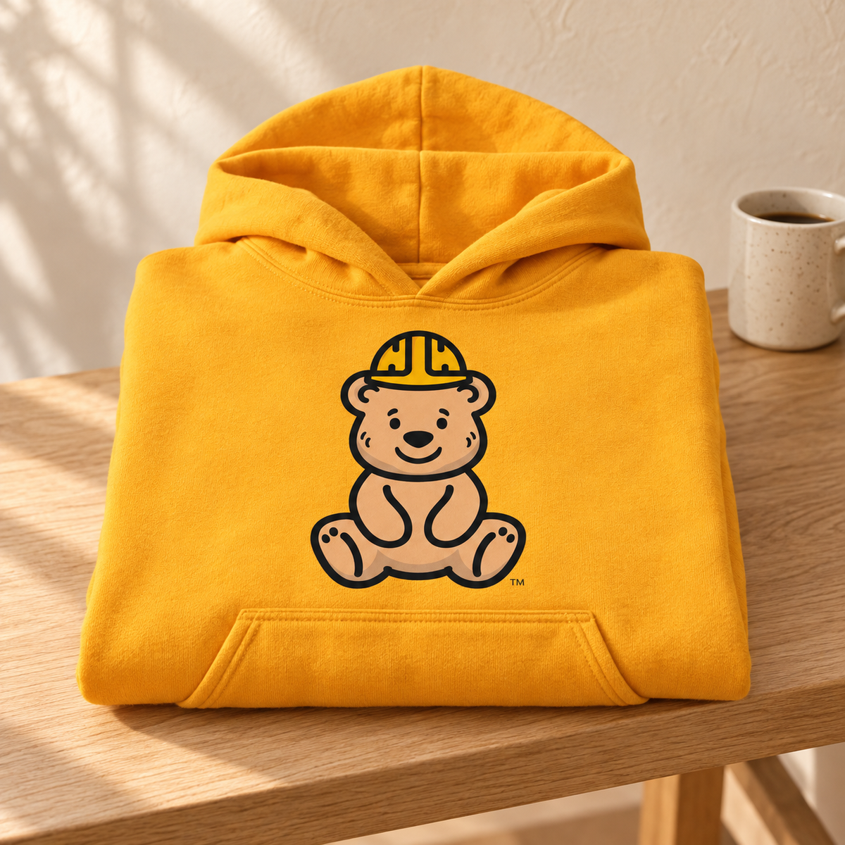 Golden Bear Hug Hoodie — folded mockup.