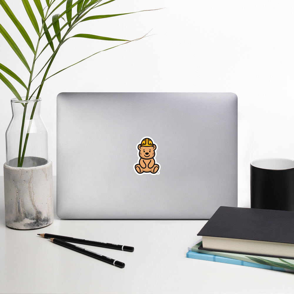 Tee Bear Sticker by By Tee, on a laptop in a neutral workspace with greenery