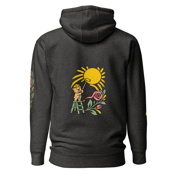 Making Room Charcoal Heather hoodie back with Tee Bear painting a golden sun beside pink roses