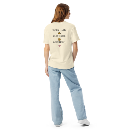 Full-length model wearing the Ivory Work Hard Icons relaxed-fit T-shirt, showing the back slogan and helmet, basketball with a bear-head emblem, and heart.
