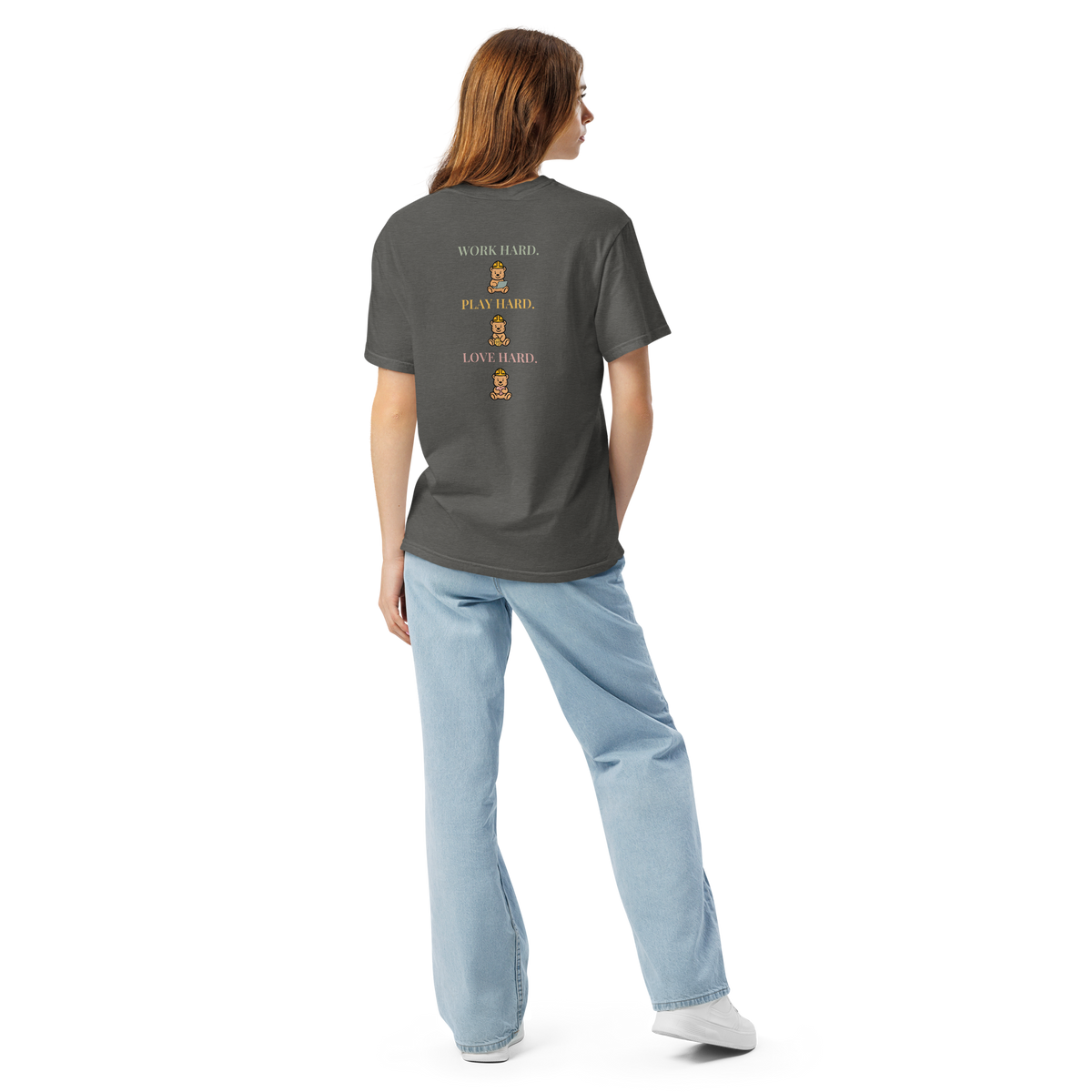 Full-length model wearing the Pepper Work Hard Three Bears relaxed-fit T-shirt, showing the back slogan and three helmeted bears with a laptop, basketball, and heart.
